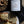 Load image into Gallery viewer, Candle labeled 'Ellington & Co. Gone Bananas' with banana slices and muffin on a plate.