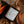 Load image into Gallery viewer, Bottle of &#39;A Piece of Cake&#39; by Ellington &amp; Co. with ingredients like carrots and brown sugar on a rustic background.
