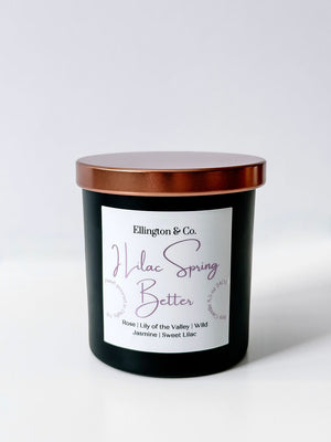 Lilac rose jasmine soy candle with wooden wick in matte black jar spring floral home fragrance Canada.
