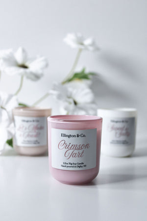 Mother's Day candle gift set with three soy candles in vintage champagne, raspberry almond cake and salted caramel scents.
